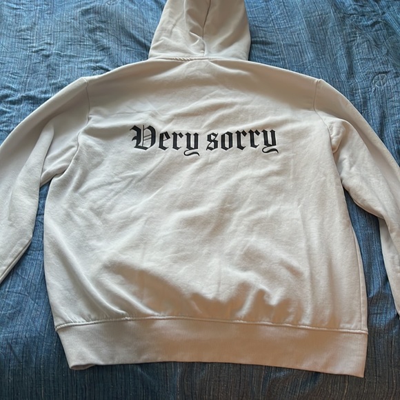 White hoodie with “very sorry” written on front and back - Picture 2 of 2